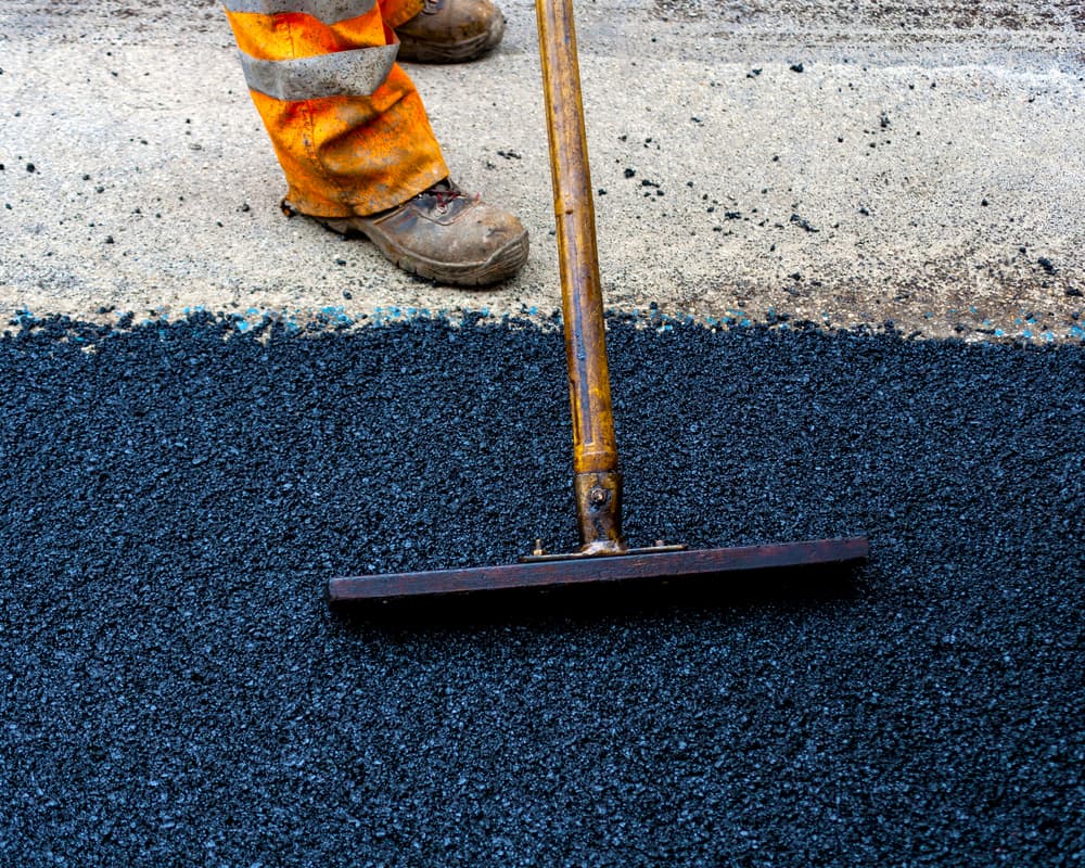 Commercial asphalt being repaired by Neyra Paving